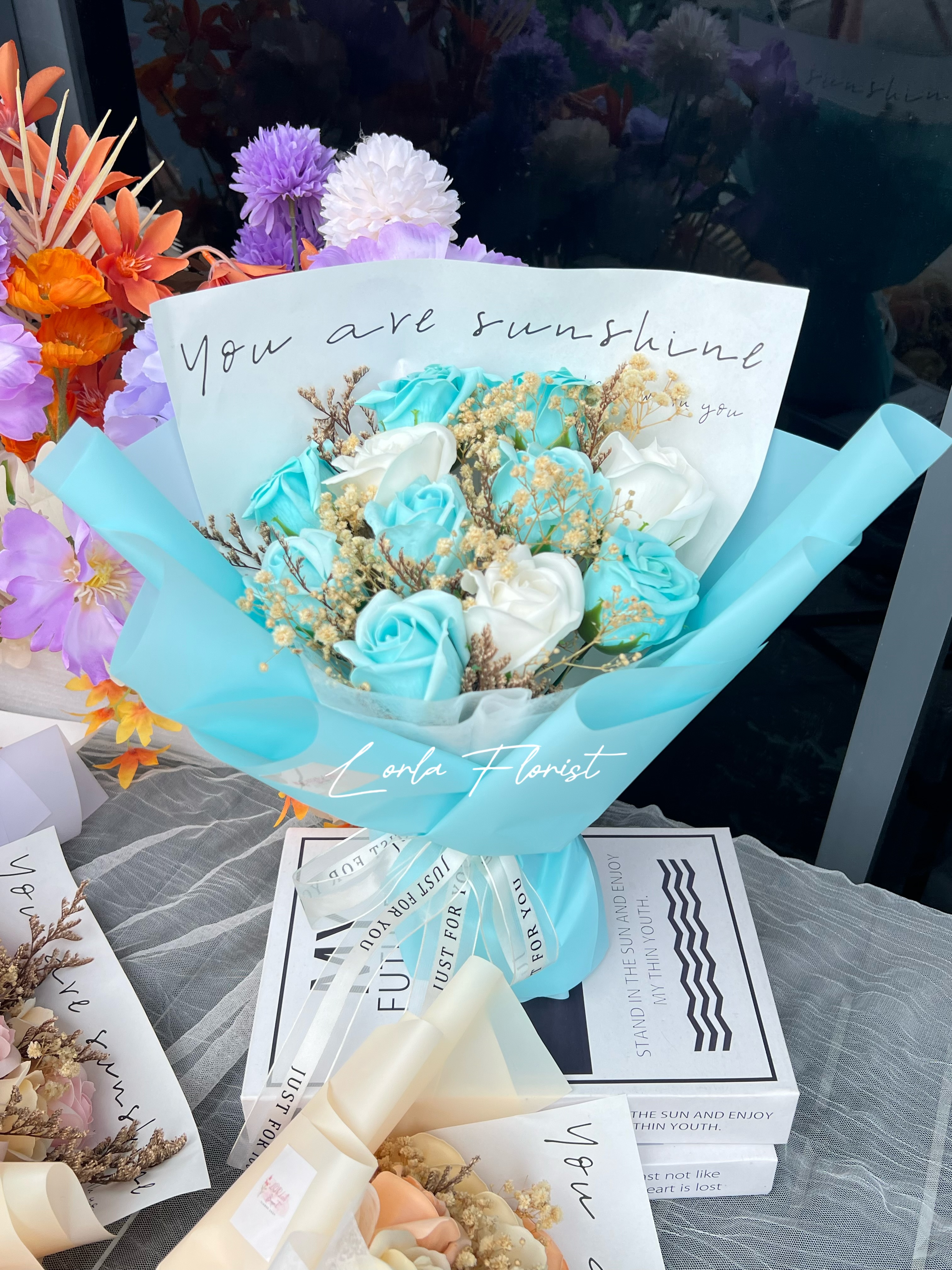 Blue bouquet arrangement by Lorla Florist