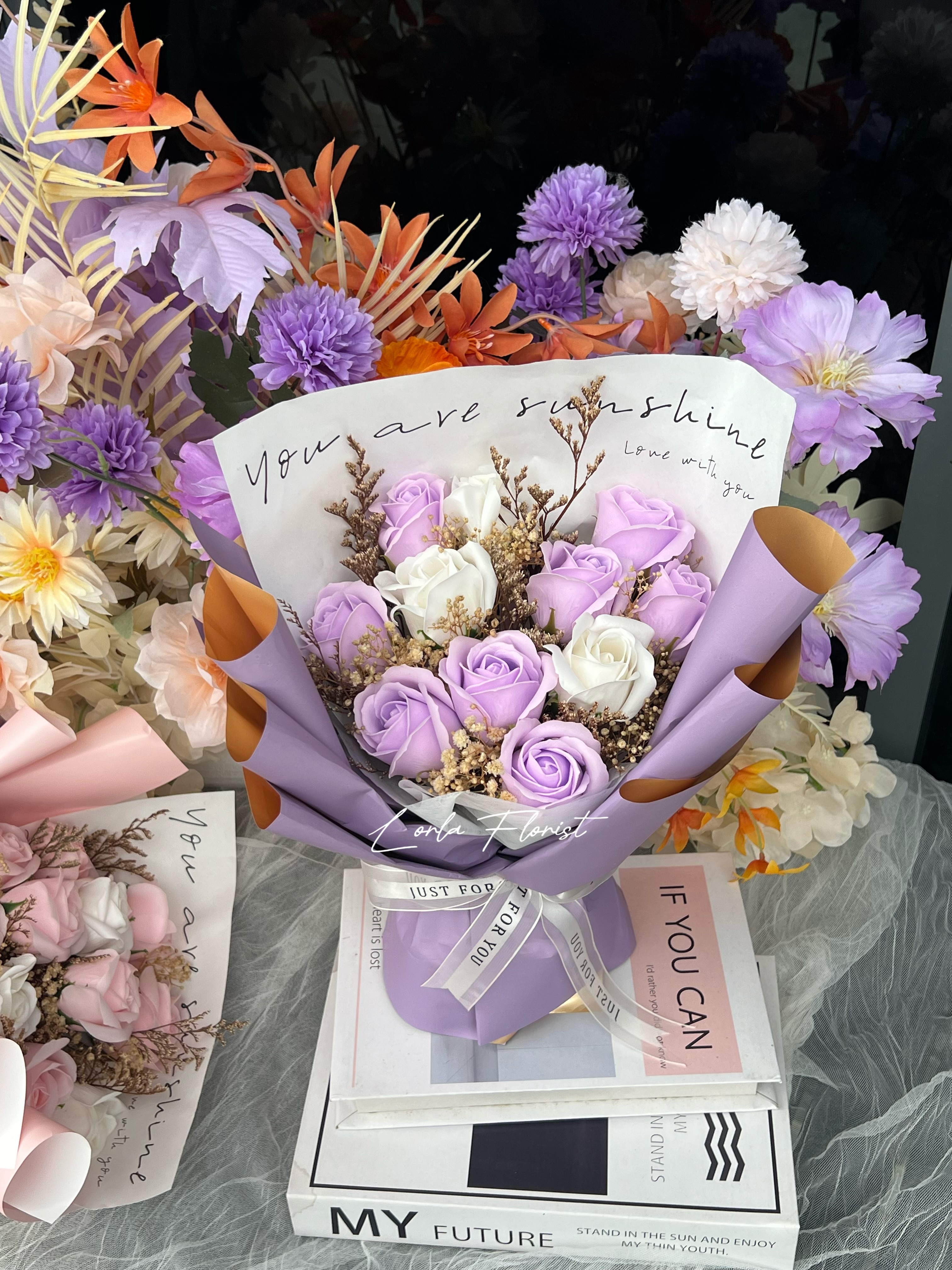 Lavender rose bouquet by Lorla Florist