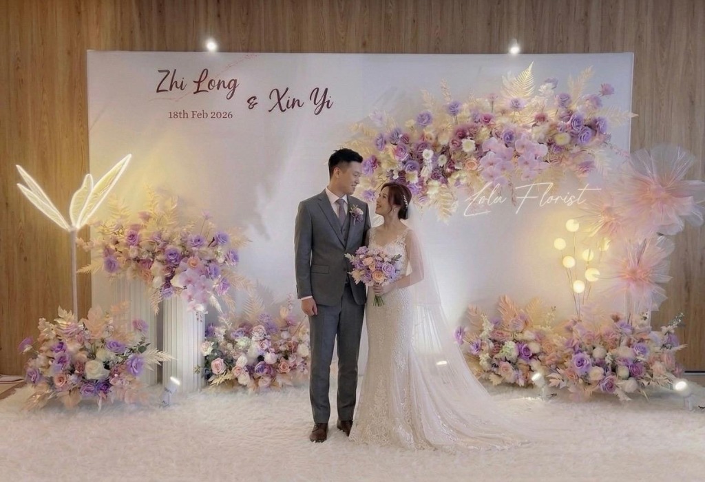 Purple themed wedding floral decoration